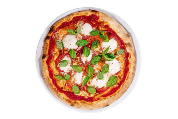 istock Caprese pizza tomatoes, mozzarella and basil on light wooden table 2193841070