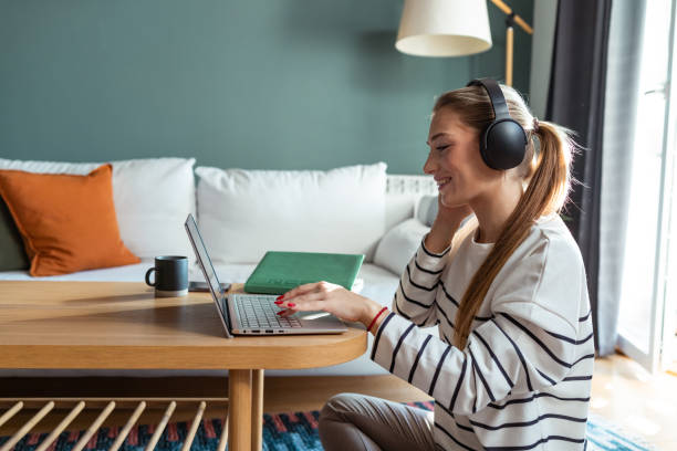 istock A young woman being productive at home 2193841570