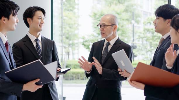 istock Business people talking in the lobby 2193841702