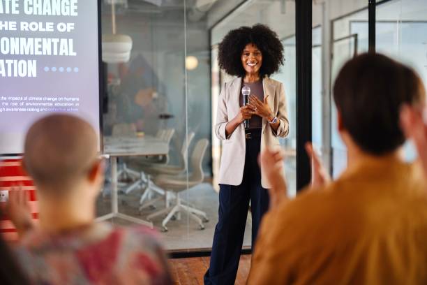 istock Black woman leading a panel discussion about sustainability 2193841840