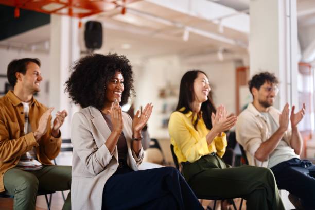 istock Business people applauding at the end of a panel discussion 2193841895