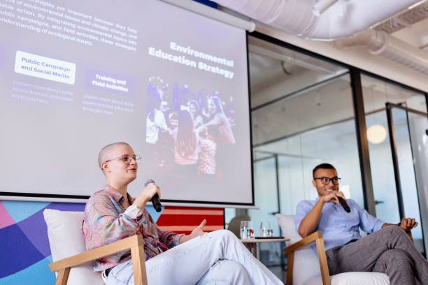 istock Man and woman leading a panel discussion 2193841905