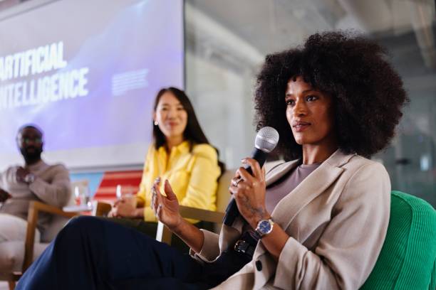 istock Close-up of a woman talking on an AI panel discussion 2193841992