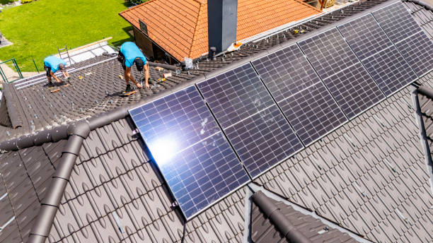 istock Skilled Caucasian Male Professionals Installing Solar Panels On Roof 2193843863