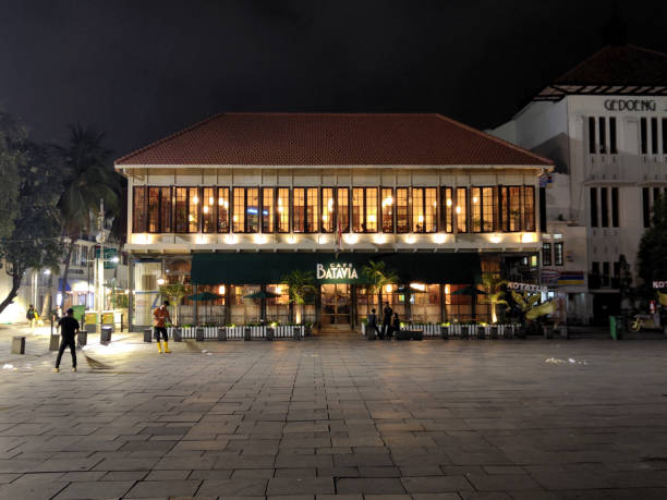 View of the historic Cafe Batavia at night, a restaurant on one of the colonial landmarks facing the square Taman Fatahillah. The building where Cafe Batavia is established is the second oldest building in the square