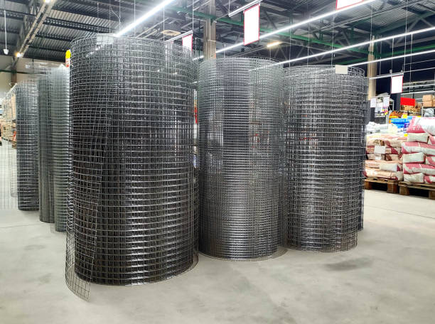 istock Sale of welded galvanized mesh in rolls in a building materials store inside, background 2193844293