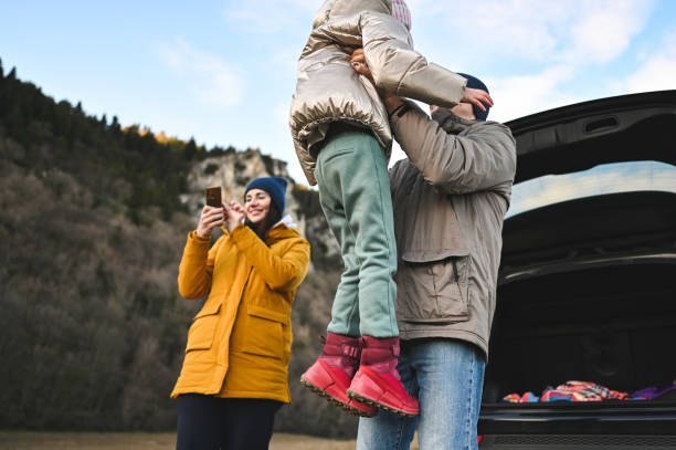 istock Playful family field trip with car. 2193848534
