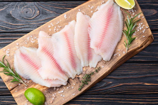 istock Raw tilapia fillet photography . Top view 2193854254