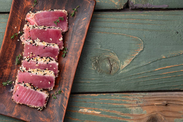 istock Sliced tuna steak with sesame photography . Top view 2193854297
