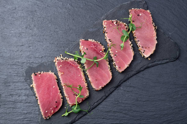 istock Sliced tuna steak with sesame photography . Top view 2193854328