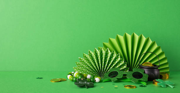istock Green decorations for Saint Patrick's Day featuring coins, fan shapes, and thematic items 2193856466