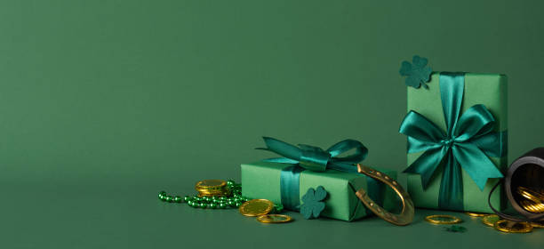 Green-themed side view presents and festive decorations on a Saint Patrick's Day composition for celebration