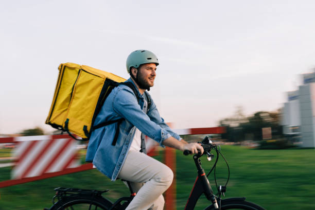 istock Courier on bicycle with parcel, bike delivery service 2193858676
