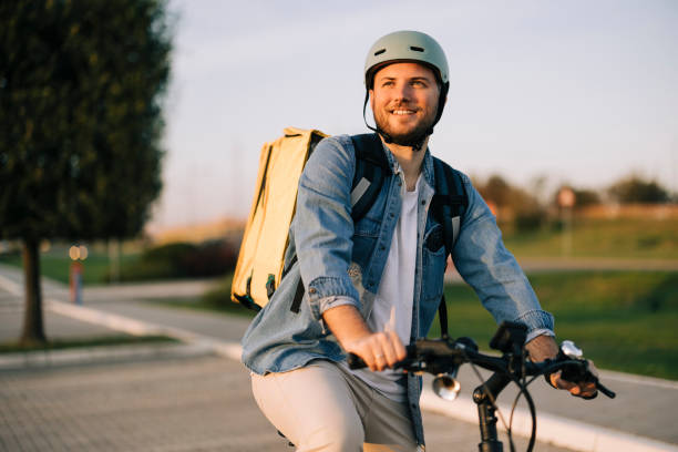 istock Courier on bicycle with parcel, bike delivery service 2193858755