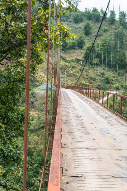 istock Sa Pa, Vietnam. Lush Green Suspension Bridge Pathway 2193860273