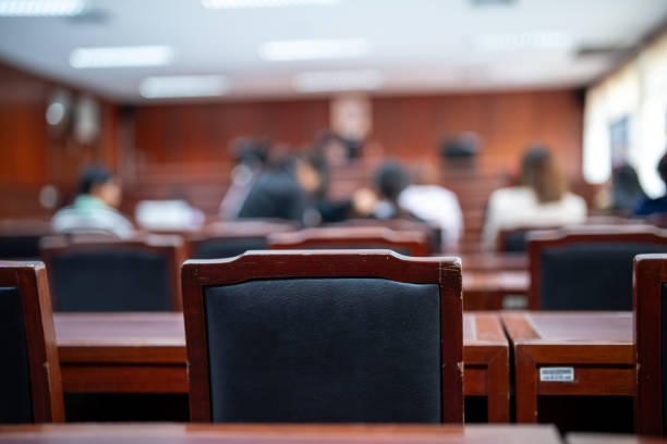 istock A classroom with a black chair in the foreground 2193860320