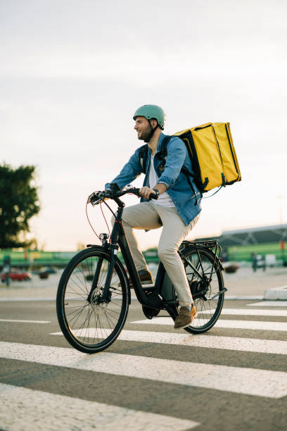 istock Courier on bicycle with parcel, bike delivery service 2193860386