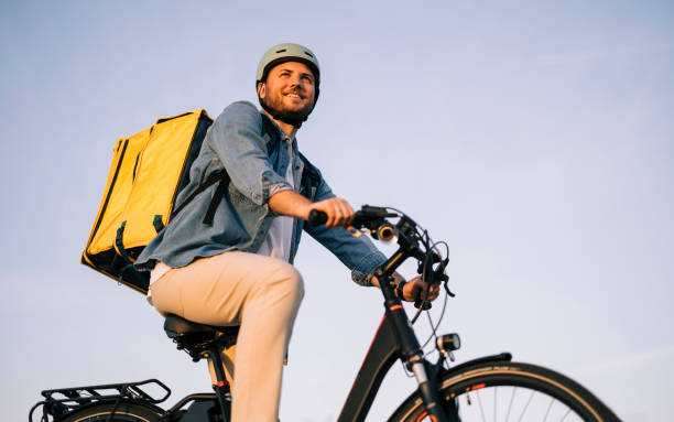 istock Courier on bicycle with parcel, bike delivery service 2193860826