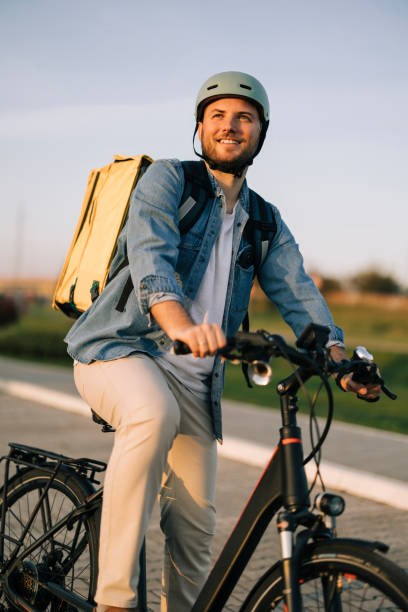 istock Courier on bicycle with parcel, bike delivery service 2193860885