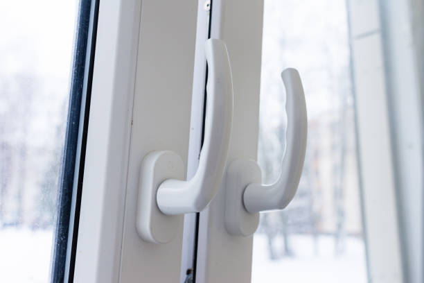 istock An opened vinyl plastic white window on the winter background. Closeup. 2193862030