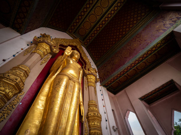 istock Golden Standing Buddha Statue in Phra Pathom Chedi The Tallest Stupa 2193864298