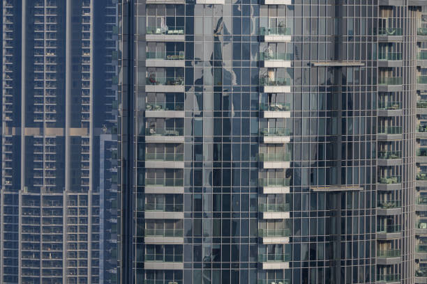 High rise luxury glass apartments in downtown district Dubai