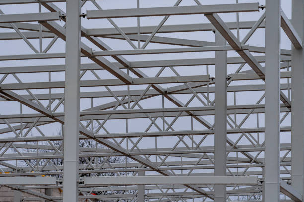 istock Modern Steel Frame of Industrial Building Under Construction. Geometric Steel Structure Framework in Progress. 2193866411