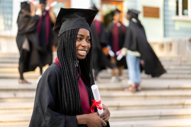 istock Side view of smiling female graduate 2193866737
