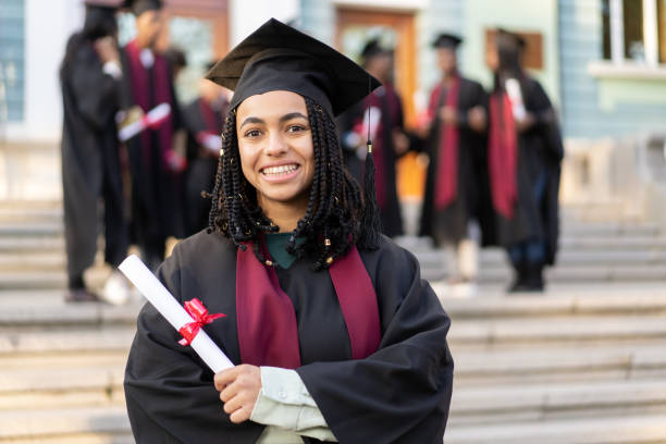 istock A university student clasping her certificate of graduation 2193866770