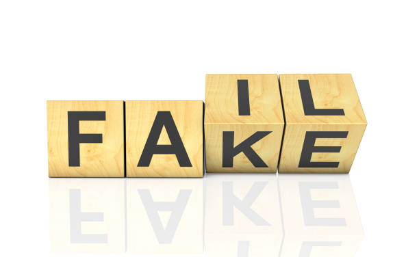 istock Wooden block cube flipping FAIL to FAKE 2193869549