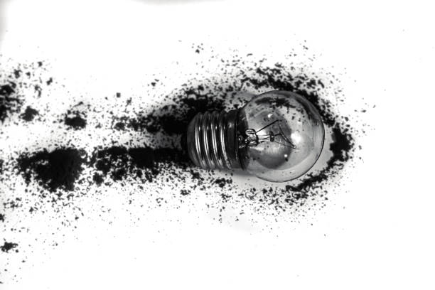 Fourlight bulbs stand on a wooden table