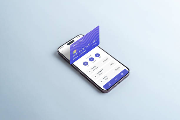 istock Credit card emerging from a smartphone on a table, displaying a digital wallet app. Concept of managing accounts, credit cards, and expenses 2193872007