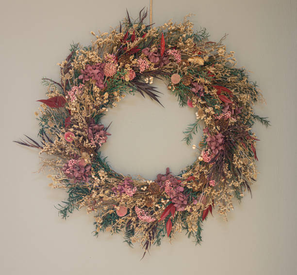 Decorative dried flower wreath hanging on a wall
