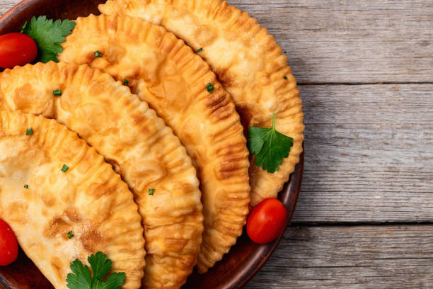 istock Snack chebureks. Pasties with meat photography . Top view 2193873736