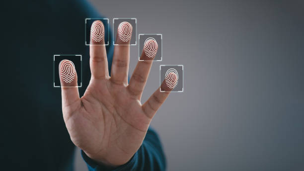 istock Hand with highlighted fingerprints in digital squares, representing biometric identification and security technology. 2193874563