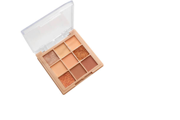 istock Neutral Eyeshadow Palette with Matte and Shimmer texture, natural colored shades on beige. Set of eyeshadow refills, Top view , makeup, beauty concept 2193875712