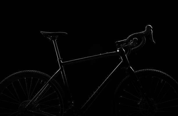 istock Silhouette of black bicycle on black background. 2193877618