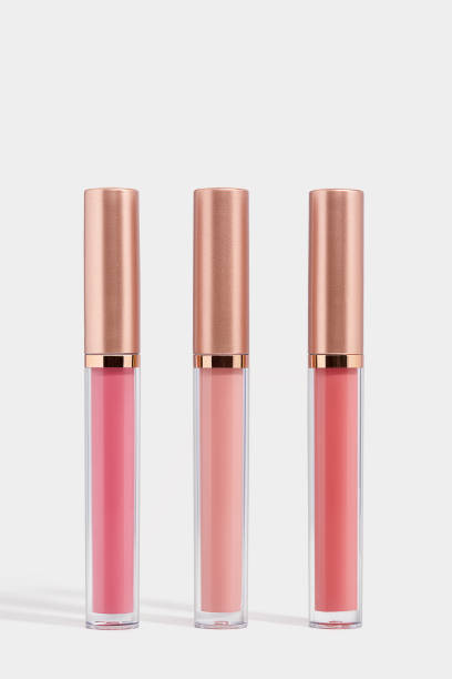 istock Liquid lipsticks, three shade matte lip gloss on white background 2193879531