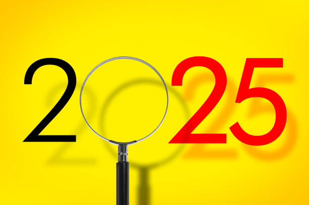 istock NEW YEAR 2025 CONCEPT seen through a magnifying glass 2193882399