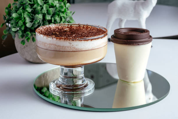 istock coffee in a cup and dessert on a plate 2193882475