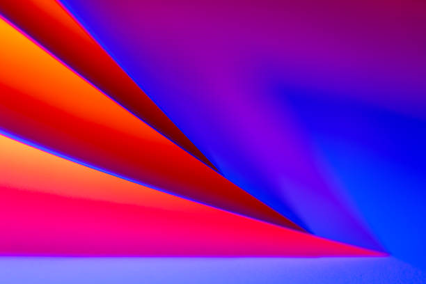 Curved shapes in vibrant red and blue tints blend together harmoniously, creating an engaging abstract composition that invites the viewer to explore textures and colors.