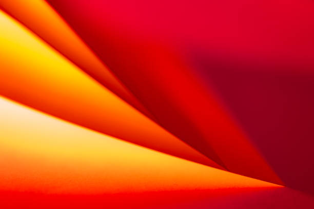 istock Colorful abstract curves in shades of red and orange tints creating a dynamic visual experience 2193882700