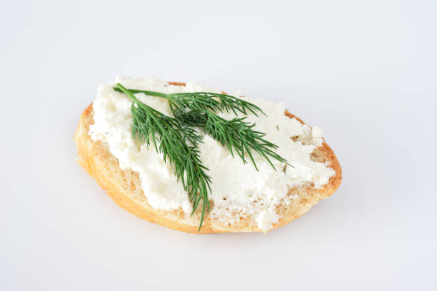 istock a sandwich with creamcheese and some greenery close up 2193886245