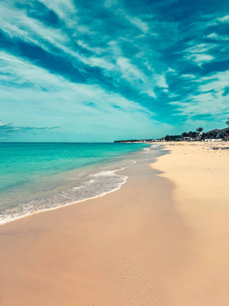 Bimini, Bahamas - January 3, 2025: Waves lapping the beaches of Bimini in the Bahamas