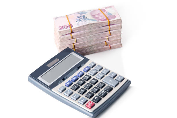 istock 200 Turkish Lira Banknotes and calculator 2193886791