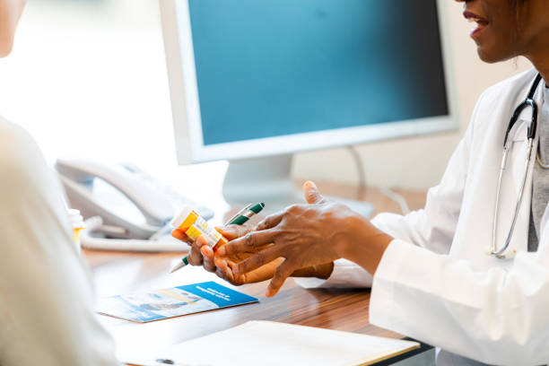 istock Doctor explaining prescription medication to patient 2193889747