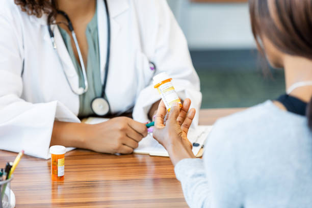istock Doctor explaining prescription medication to patient 2193889761