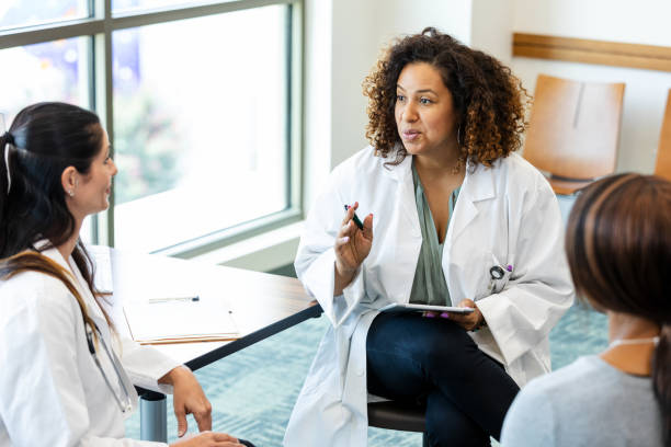 istock Doctor Leading Group Therapy Session, Mental Health Professional 2193889788
