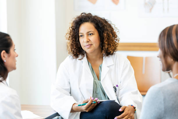 istock Doctor and Patients in a Group Therapy Session 2193889807
