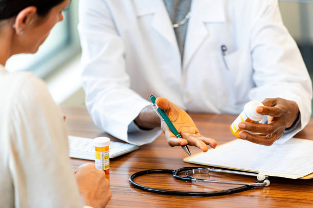 istock Doctor explaining prescription medication to patient 2193889835